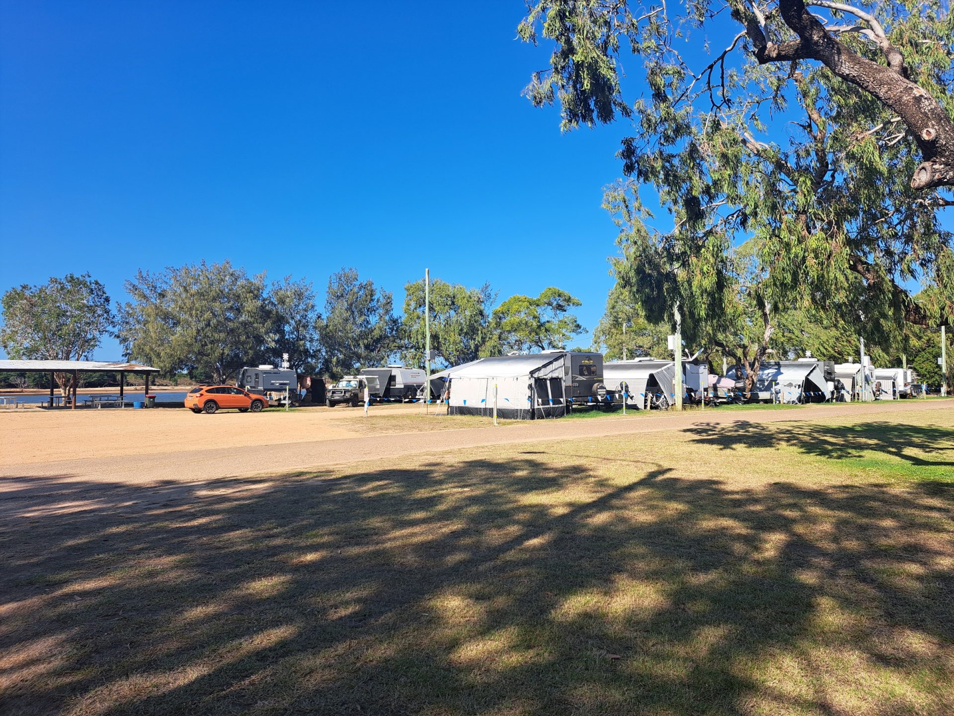 Caravan sites beside the water at Groper Creek