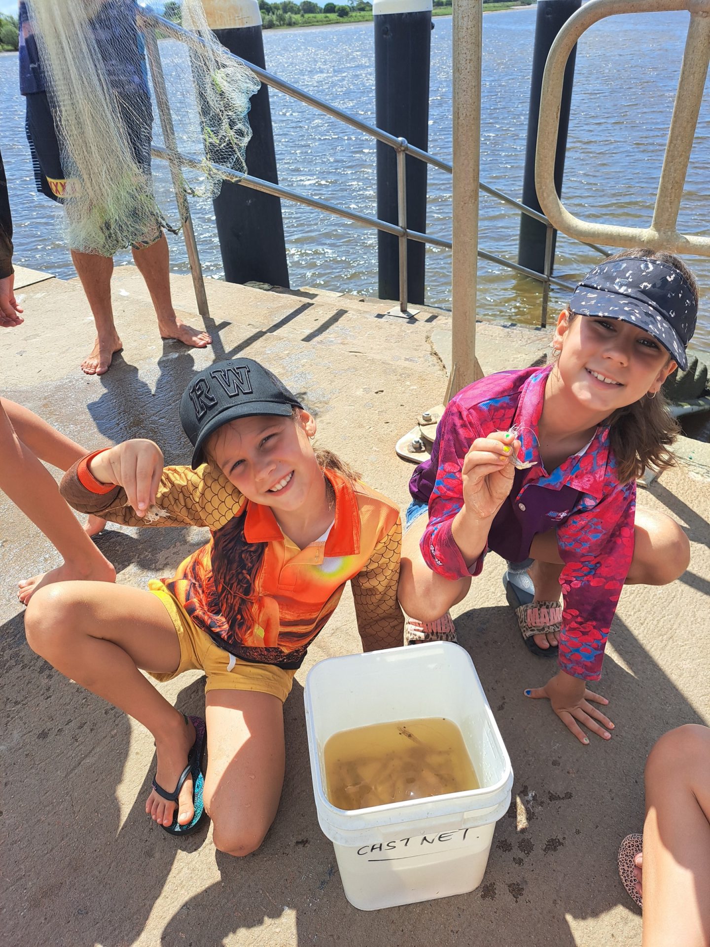 Children prawning from the jetty at Groper Creek