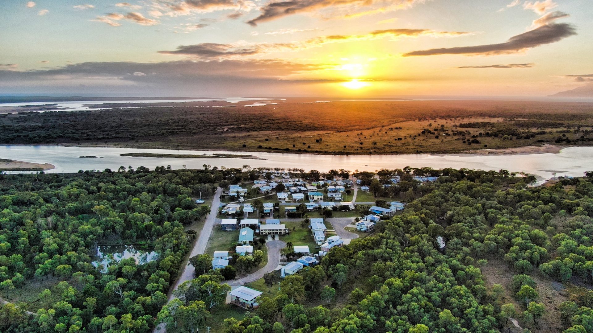 Sunset over Groper Creek township and tidal waterways